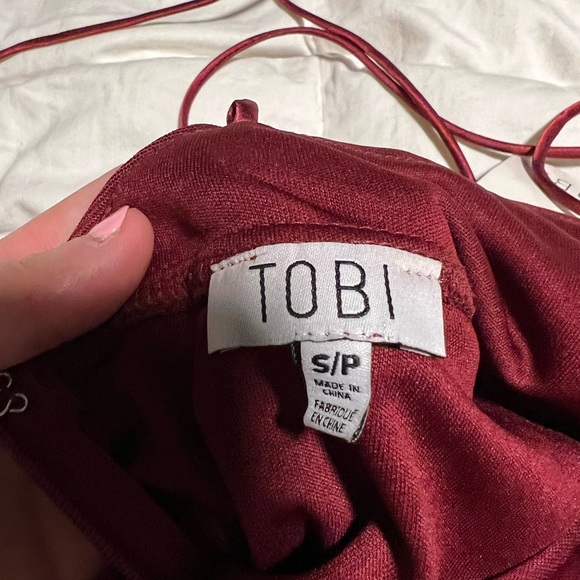 TOBI size small NWT mini dress with deep V neckline and flowy material. - Picture 2 of 4